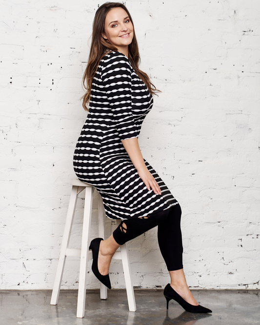 plus size woman on stool