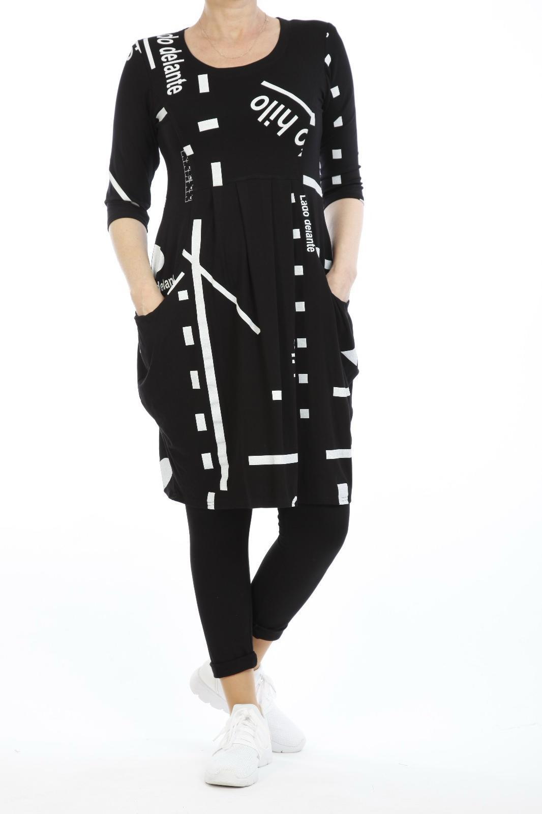 Damen Kleid mit Taschen – Schwarz Weiß – Asymmetrischer Druck – Freizeitkleid mit Schrift – Langarm – Baumwolle – Oversize Tunika – Streetwear Stil“